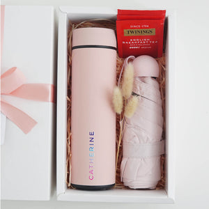 For her #3 - Vacuum Flask, Twinings Tea , Pocket Size Umbrella